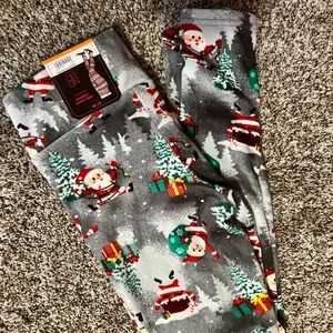 Fuzzy, Santa print, never worn, high-waist leggings.